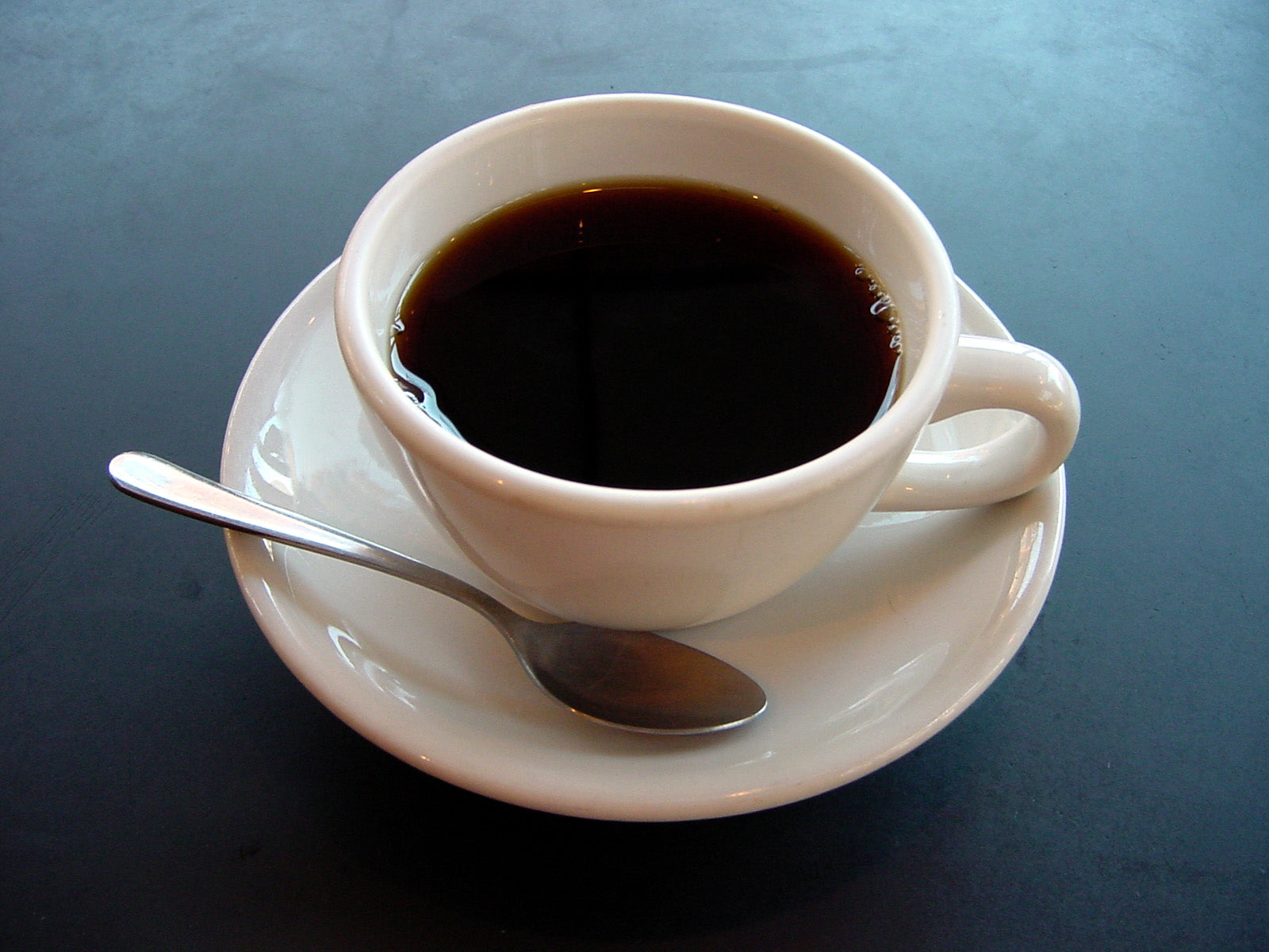 A small espresso cup of coffee, the everyday drink that kava drinkers most commonly ask about for interactions